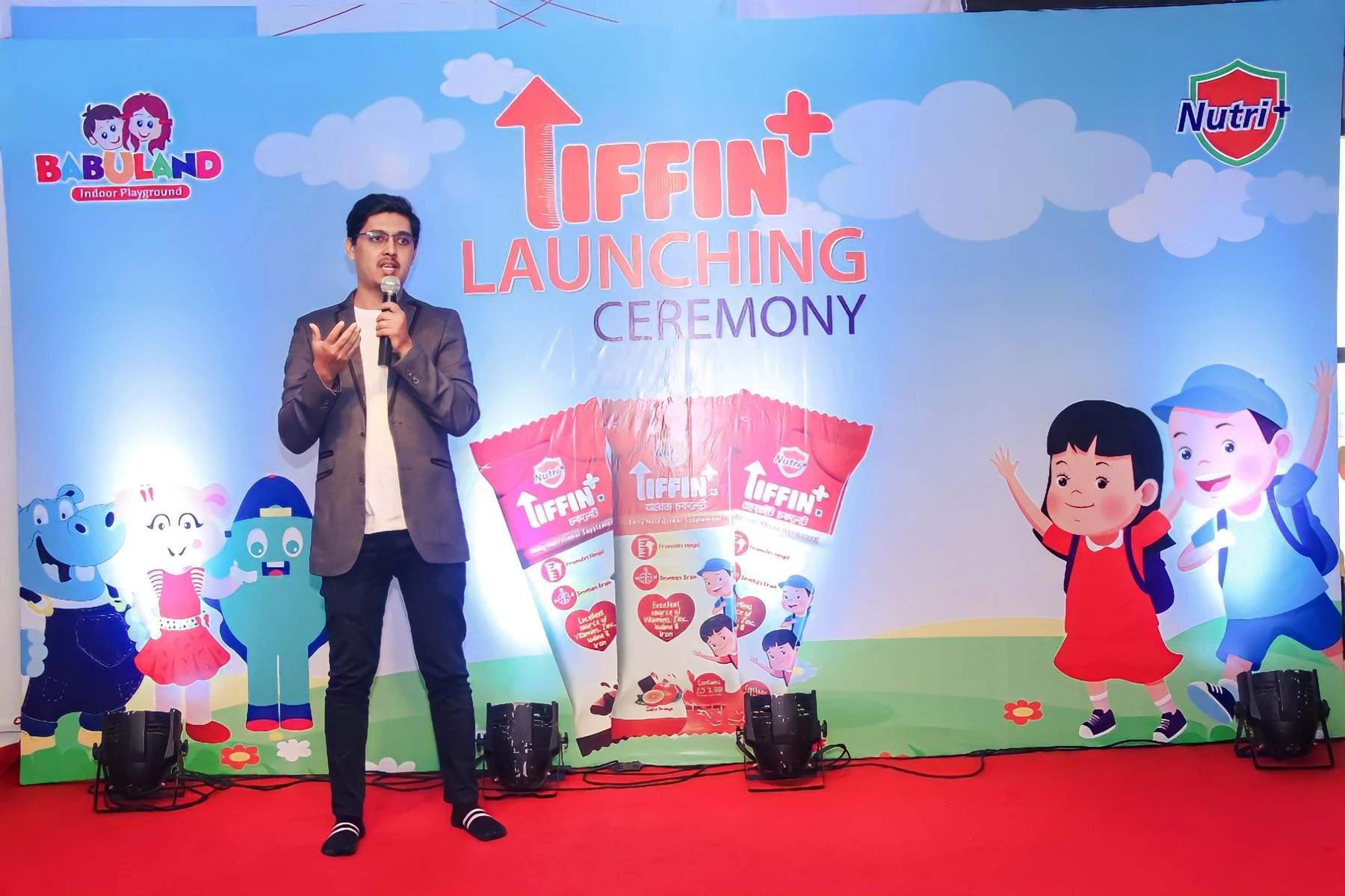 Tiffin+ launch at Babuland — stage presentation